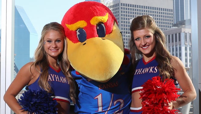 Kansas Jayhawks cheerleaders and mascot pose for a photo during the Big 12 Media Days at Omni Dallas Hotel.