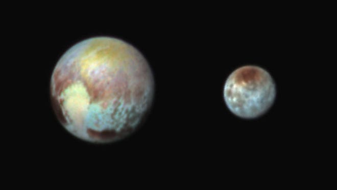 This July 13, 2015, image of Pluto and Charon is presented in false colors to make differences in surface material and features easy to see. It was obtained by the Ralph instrument on NASA's New Horizons spacecraft, using three filters to obtain color information, which is exaggerated in the image. These are not the actual colors of Pluto and Charon, and the apparent distance between the two bodies has been reduced for this side-by-side view.
