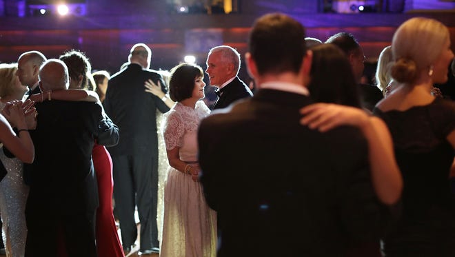 Vice President-elect Mike Pence and his wife Karen Pence take the first dance at the Indiana Society Ball  in Washington, D.C.