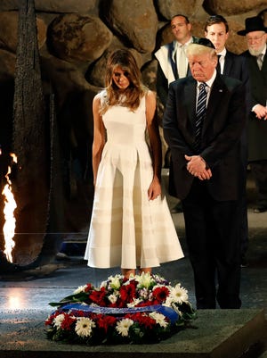 President Trump and his wife Melania attend a wreath laying ceremony during a visit to the Yad Vashem Holocaust Memorial museum in Jerusalem on May 23, 2017.