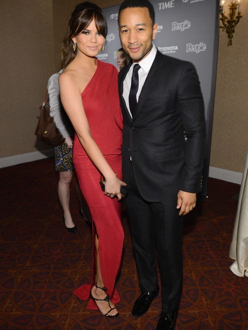 WASHINGTON, DC - APRIL 26:  Chrissy Teigen and  John Legend attend the PEOPLE/TIME Party On The Eve Of The White House Correspondents' Dinner on April 26, 2013 in Washington, DC.  (Photo by Larry Busacca/Getty Images for Time Inc) ORG XMIT: 163232073 ORIG FILE ID: 167614357