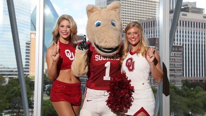 Oklahoma Sooners cheerleaders and mascot pose for a photo during the Big 12 Media Days at Omni Dallas Hotel.