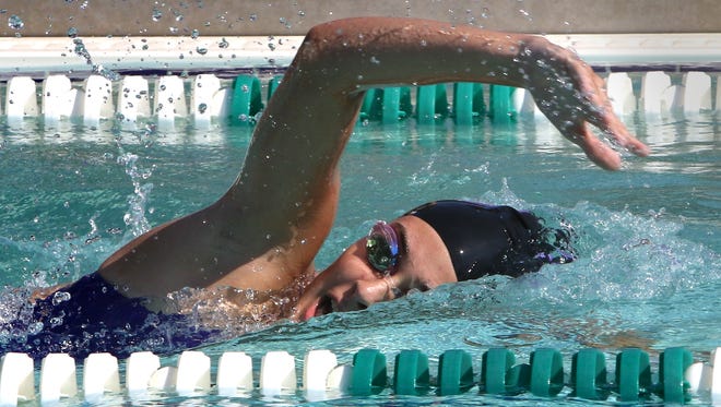 Oconomowoc's Payton Sheridan swims the 400-meter freestyle during the Whitnall Falcon FunFest Invitational on Aug. 19 at the Village Club in Greendale, the season's only outdoor swim meet.