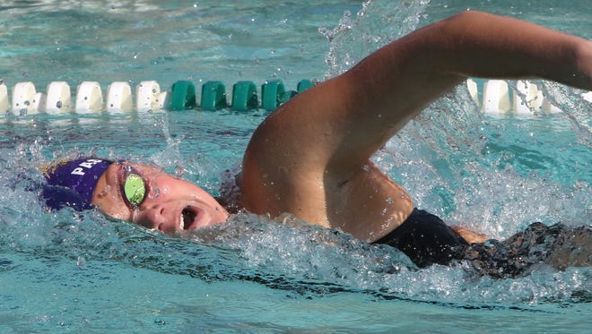 New Berlin Eisenhower's Bella Passamani swims the 400-meter freestyle during the Whitnall Falcon FunFest Invitational on Aug. 19 at the Village Club in Greendale, the season's only outdoor swim meet.