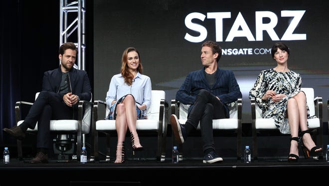 Actors Richard Rankin, from left, Sophie Skelton, Tobias Menzies and Caitriona Balfe participate in the 'Outlander' panel for Starz.