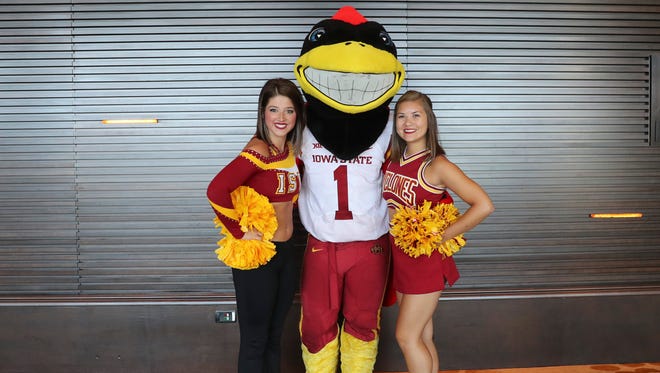 Iowa State Cyclones cheerleaders and mascot pose for a photo during the Big 12 Media Days at Omni Dallas Hotel.