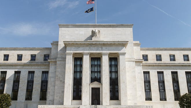 Minutes of the Economists planned to scour the minutes of the Federal Reserve's early February meeting for signals of a possible interest rate hike in March.