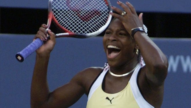Serena Williams, 17, celebrates her victory over Switzerland's Martina Hingis in the women's finals at the 1999 U.S. Open.