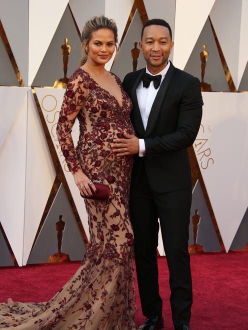 Chrissy and John highlighted their growing family on the red carpet during the Oscars in 2016.