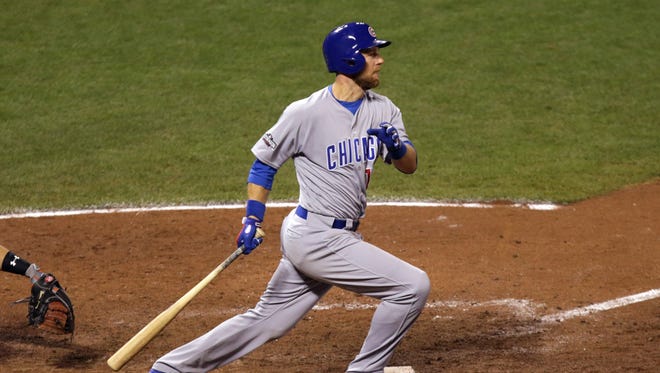 Game 4 in San Francisco: Cubs second baseman Ben Zobrist hits an RBI single during the ninth inning.