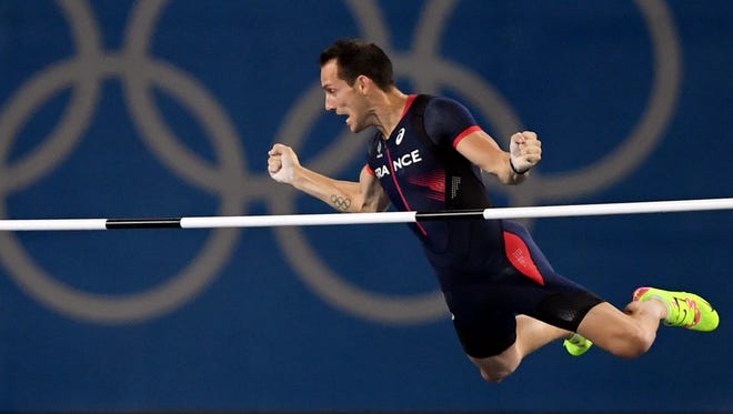 France's Renaud Lavillenie competes in the pole vault.