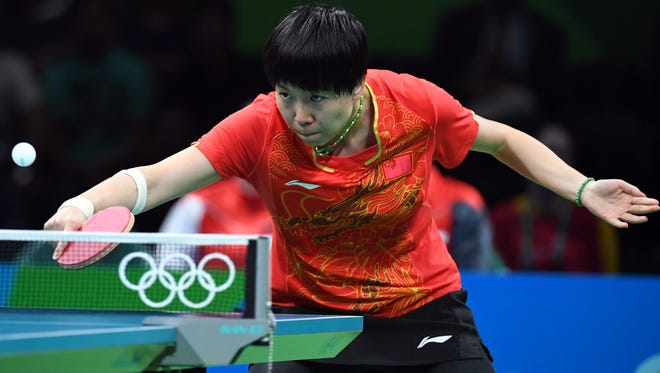 Xiaoxia Li of China competes during the women's semifinals in the Rio 2016 Summer Olympic Games at Riocentro - Pavilion 3.