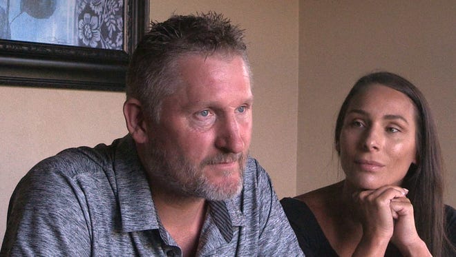Rick (left) and Jamie Valeri talk about their 2015 vacation in Mexico where they were drugged and she was assaulted. They are shown at their home in Neenah, Wis.