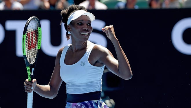 Venus Williams of the United States reacts during her Women's Singles first round match against Kateryna Kozlova of Ukraine at the Australian Open Grand Slam tennis tournament in Melbourne.