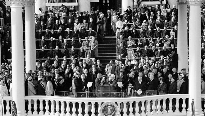 Lyndon B. Johnson takes the oath of office during inaugural ceremonies at the Capitol on Jan. 20, 1965.