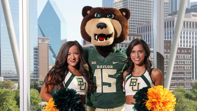 Baylor Bears cheerleaders and mascot pose for a photo during the Big 12 Media Days at Omni Dallas Hotel.