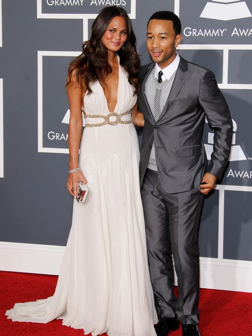 1/31/10 4:43:32 PM -- Los Angeles, CA, U.S.A  -- John Legend and Chrissy Teigen arrive for the 52nd annual Grammy Awards. --    Photo by Dan MacMedan, USA TODAY contract photographer   ORG XMIT: DM 37934 2010 GRAMMY 1/29/2010  (Via MerlinFTP Drop)