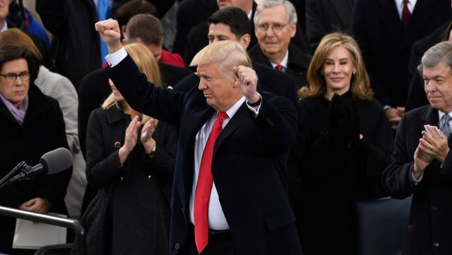 President Donald Trump acknowledges the crowd after speaking during his 2017 Presidential Inauguration.