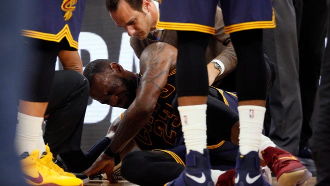 LeBron James took an elbow to the back of his neck.