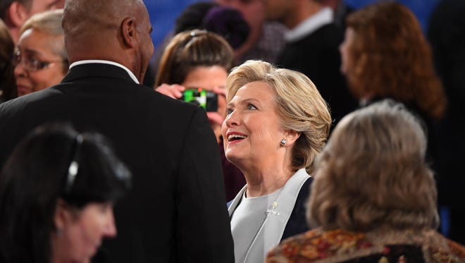 Democratic presidential candidate Hillary Clinton meets with people after the second presidential debate at Washington University in St. Louis.