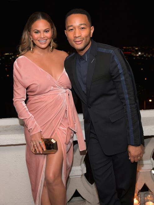 Chrissy and John posed together at a GQ and Dior Homme private dinner in celebration of The 2017 GQ Men Of The Year Party in December 2017.