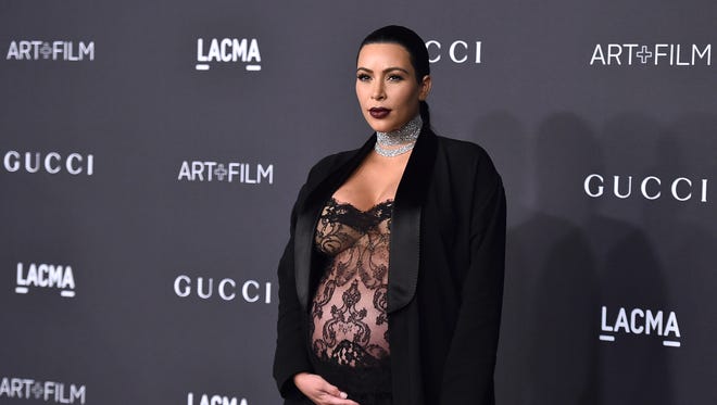 Kim Kardashian attends LACMA 2015 Art+Film Gala at LACMA on Saturday, Nov. 7, 2015, in Los Angeles. (Photo by Jordan Strauss/Invision/AP) ORG XMIT: CAJS115