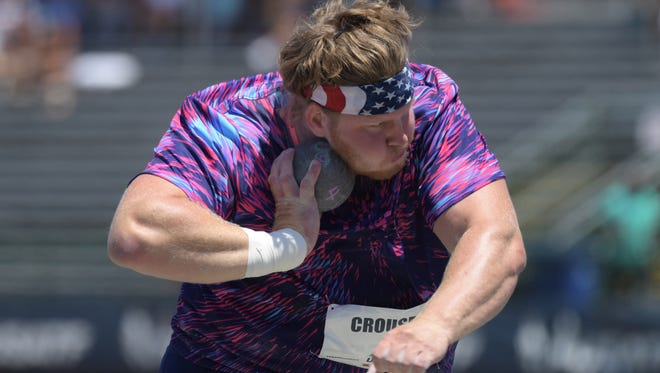 Ryan Crouser wins the shot put with a throw of 74-3 3/4 (22.65m).
