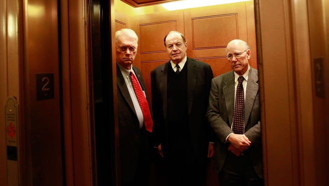 WASHINGTON - DECEMBER 21: (L-R) Sen. Jim Bunning (R-KY), Sen. Richard Shelby (R-AL), and Sen. Pat Roberts (R-KS) get into an elevator after coming off the Senate floor after a procedural vote on health are reform on December 21, 2009 in Washington, DC.