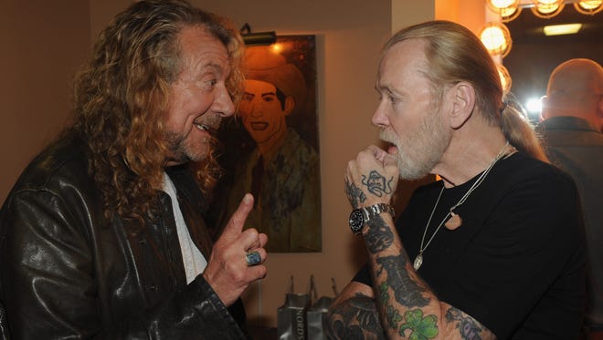 Robert Plant (L) and Gregg Allman are seen backstage at the 10th Americana Music Association honors and awards at the Ryman Auditorium on October 13, 2011, in Nashville, Tenn.