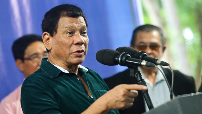 Filipino President Rodrigo Duterte speaks during a visit to troops in Iligan city in the southern Philippines on Friday.