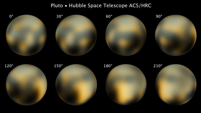 This image obtained from NASA on February 4, 2010, shows the newest images of Pluto taken by the Hubble Space Telescope. Pluto, the dwarf planet on the outer edge of our solar system, has a dramatically ruddier hue than it did just a few years ago, NASA scientists said Thursday, after examining the photos. They said the distant orb appears mottled and molasses-colored in recent pictures, with a markedly redder tone that most likely is the result of surface ice melting on Pluto's sunlit pole and then refreezing on the other pole.   AFP/NASA   = RESTRICTED TO EDITORIAL USE = NOT FOR SALE FOR MARKETING OR ADVERTISING CAMPAIGN = (Photo credit should read -/AFP/Getty Images)