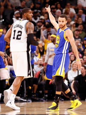 Steph Curry and the Warriors beat LaMarcus Aldridge and the Spurs for the first time this sseason.