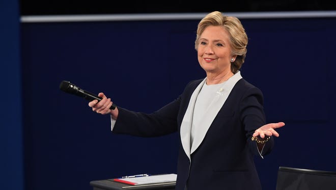 Democratic presidential candidate Hillary Clinton gestures during the second presidential debate at Washington University in St. Louis.