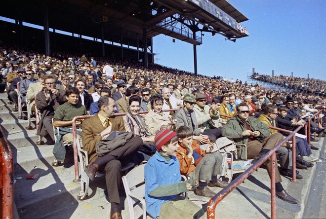 Fans in the lower grandstand bundle up during the Brewers' first opening day on April 7, 1970. The game was also the season opener for the Brewers. A crowd of 37,237 saw the Brewers fall to the California Angels 12-0.