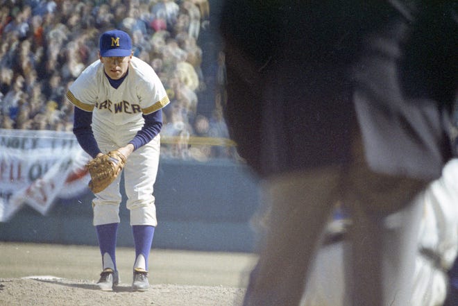 Brewers starter Lew Krausse (24) eyes up his next pitch during the Brewers' first opening day on April 7, 1970. The game was also the season opener for the Brewers. A crowd of 37,237 saw the Brewers fall to the California Angels 12-0.