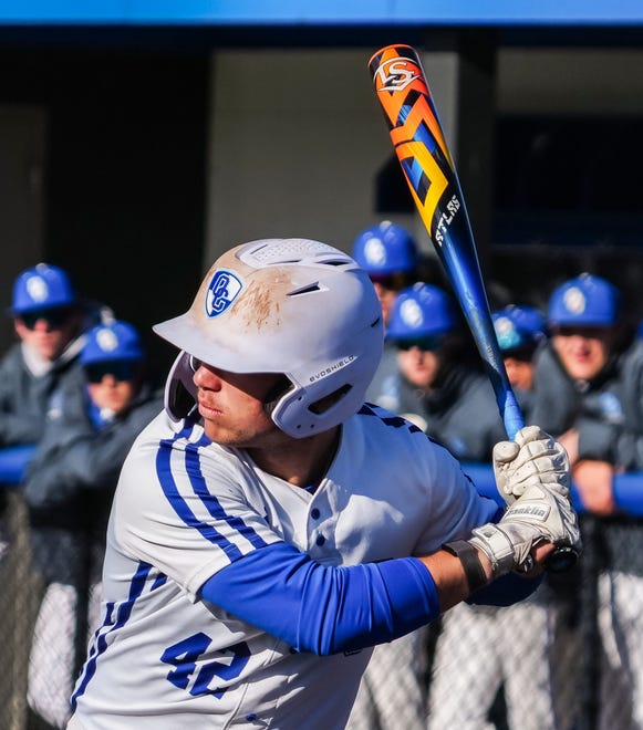 Oak Creek's Cade Palkowski (42) eyes a pitch during the game at home against Racine Horlick, Friday, April 19, 2024.