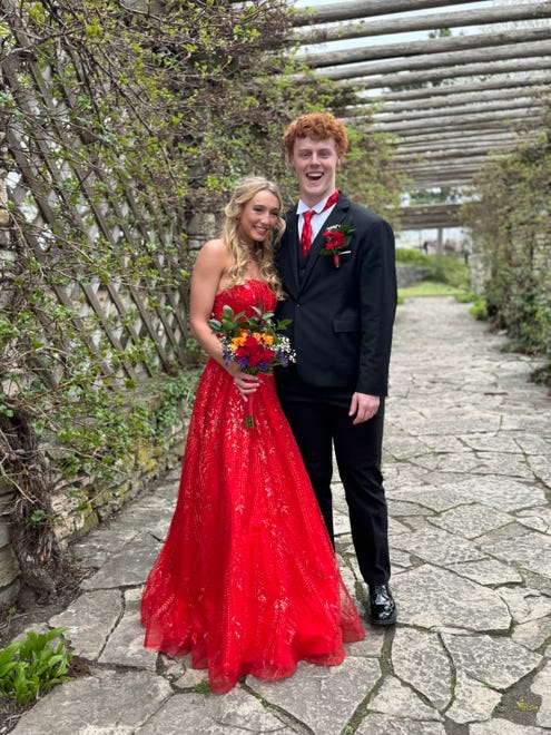 Red is their color! Muskego High School juniors Liam Shaw and Morgan Huckstorf pose for a prom photo on Saturday, April 20, 2024.