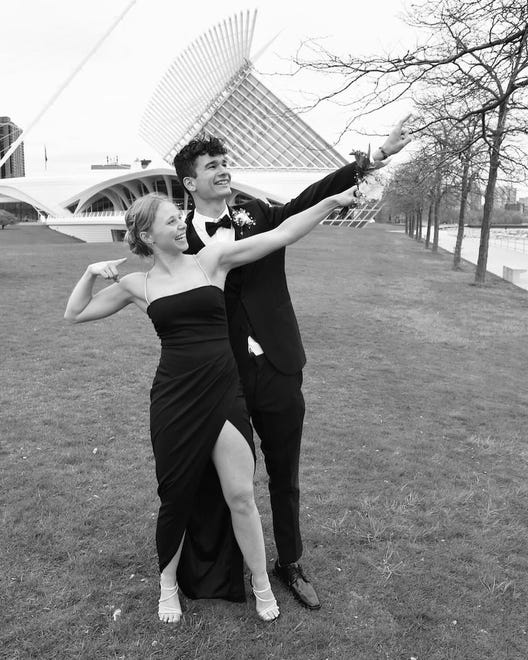 Franklin High School seniors Jackson Sikora and Michalak pose for a fun prom photo on Saturday, April 20, 2024, along the lakefront in downtown Milwaukee. The school's prom was held at Discovery World.
