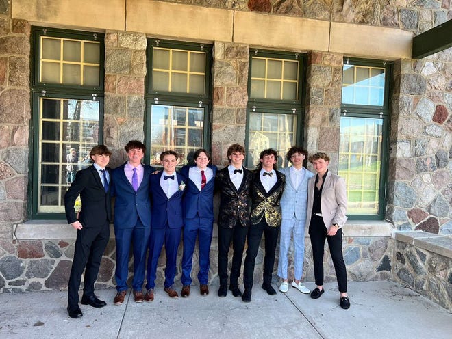 Waukesha North High School students pose for a prom photo on Saturday, April 13, 2024, at the Fish Hatchery in Delafield.