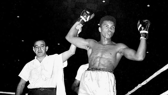 Angelo Dundee with Muhammad Ali, then named Cassius Clay, in Louisville in 1961 after his sixth straight pro win.