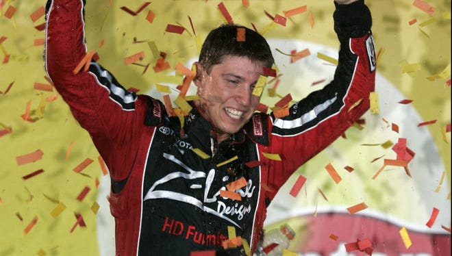 Denny Hamlin celebrates winning the Lipton Tea 250 May 2, 2008, at Richmond International Raceway, one of three Nationwide Series races Hamlin won that year.