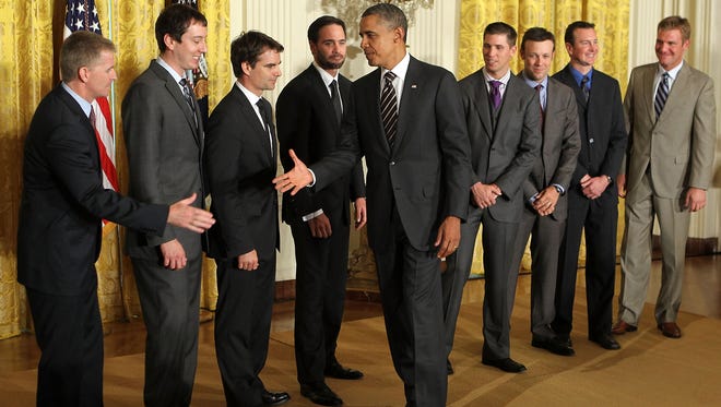 Denny Hamlin, fourth from right, watches as President Barack Obama greets Chase for the Sprint Cup drivers during an event at the White House on Sept. 7, 2011. The other drivers, from left to right:Jeff Burton, Kyle Busch, Jeff Gordon, Jimmie Johnson, Hamlin, Matt Kenseth, Kurt Busch, and Clint Bowyer.
